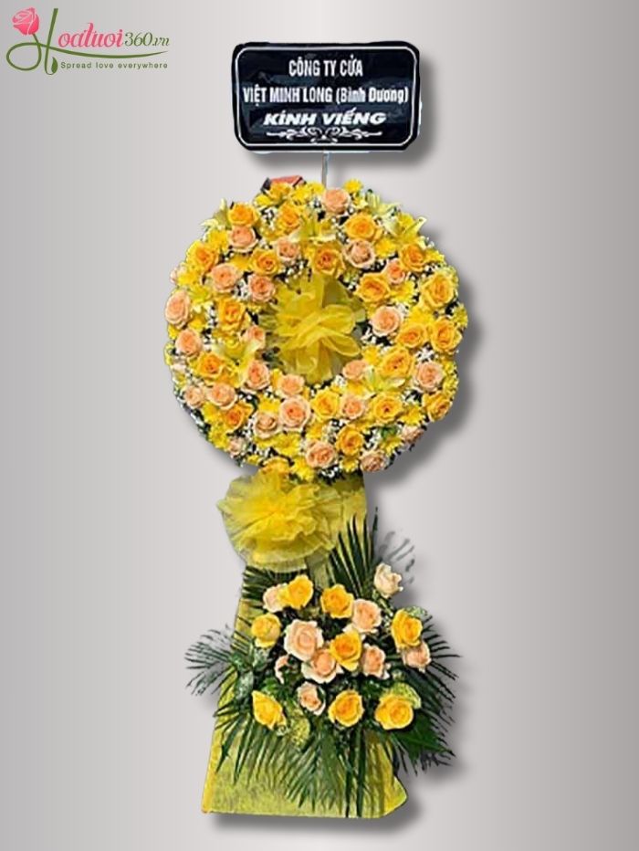 Vòng hoa hồng vàng chia buồn quận 7 