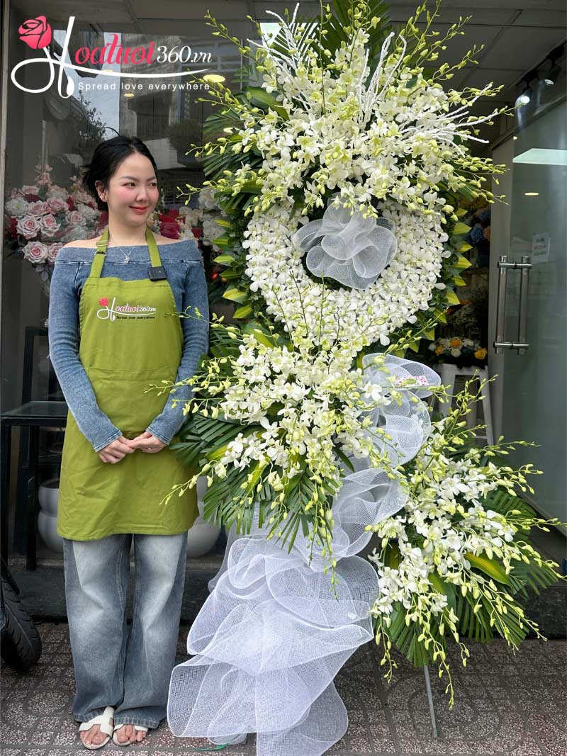 Vòng hoa chia buồn với lan mokara trắng